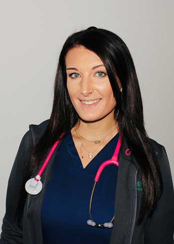 A woman with long black hair wearing a stethoscope.